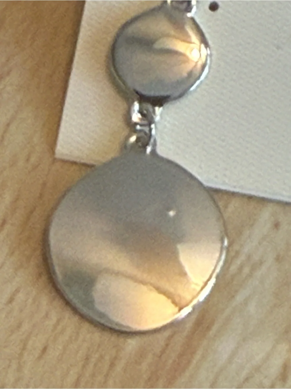 NWT. New Directions. Silver Disk Dangle Earring.